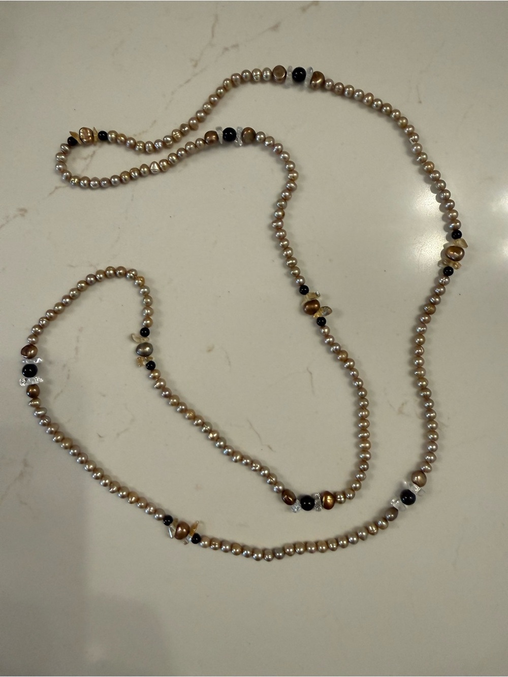 Elegant Champagne Pearl Bead Necklace with Black and Gold Accents